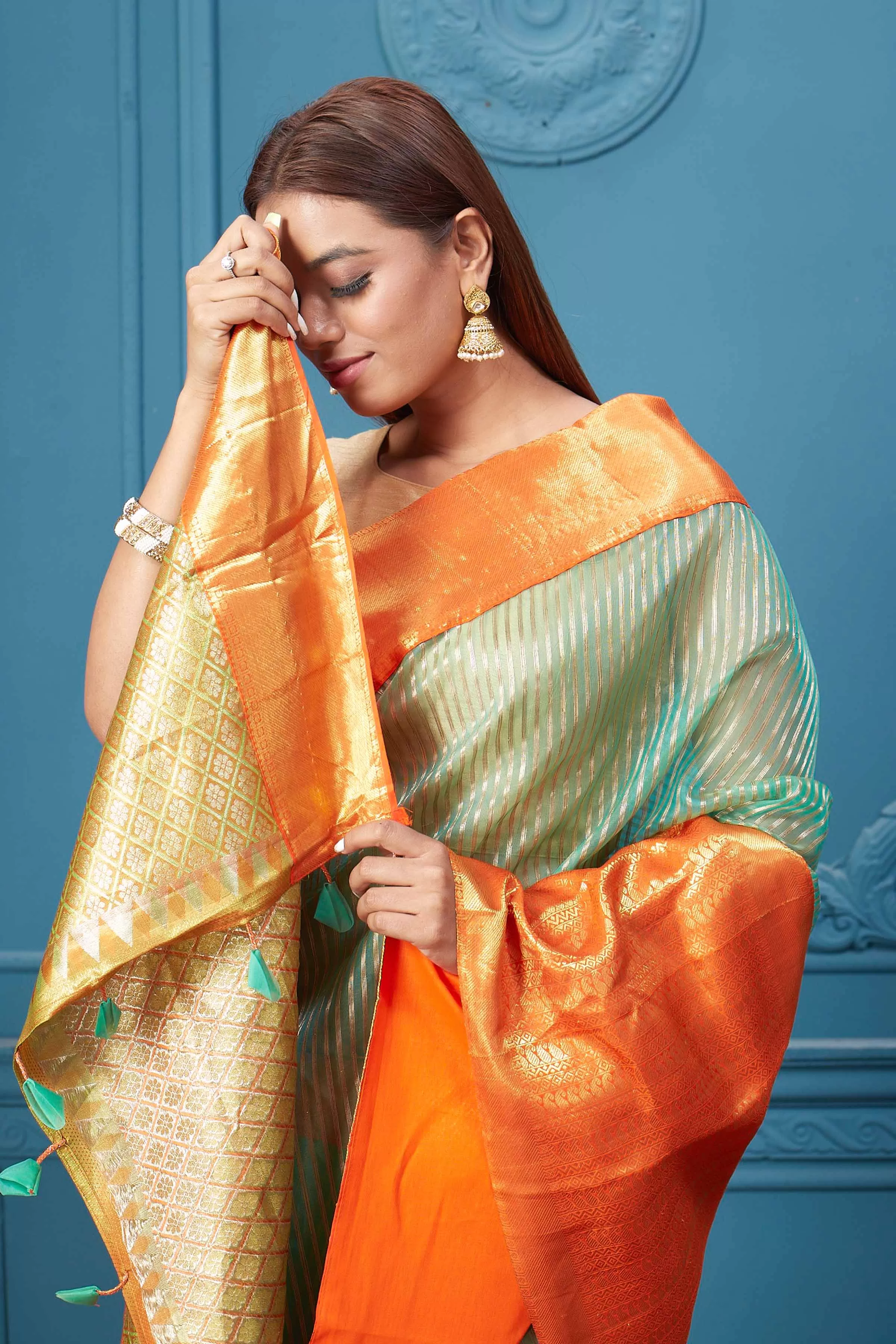 91A008 Sea Green Striped Kora Kanjivaram Sari with Orange Border