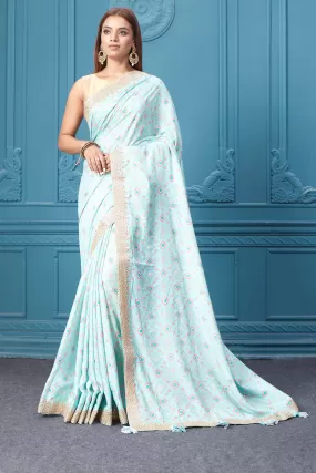 91A023 Powder Blue Printed Crepe Saree with Embroidered Border