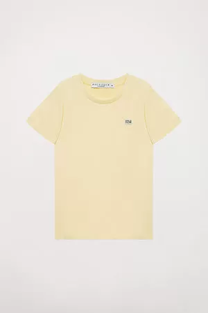 Camiseta orgánica de manga corta amarilla Neutrals kids con logo