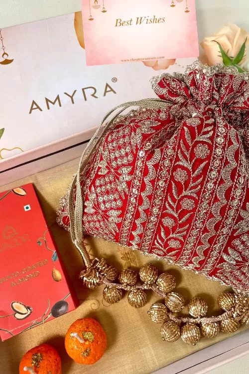 Gift hamper - Mirai embroidered red potli - Gourmet & Candle box