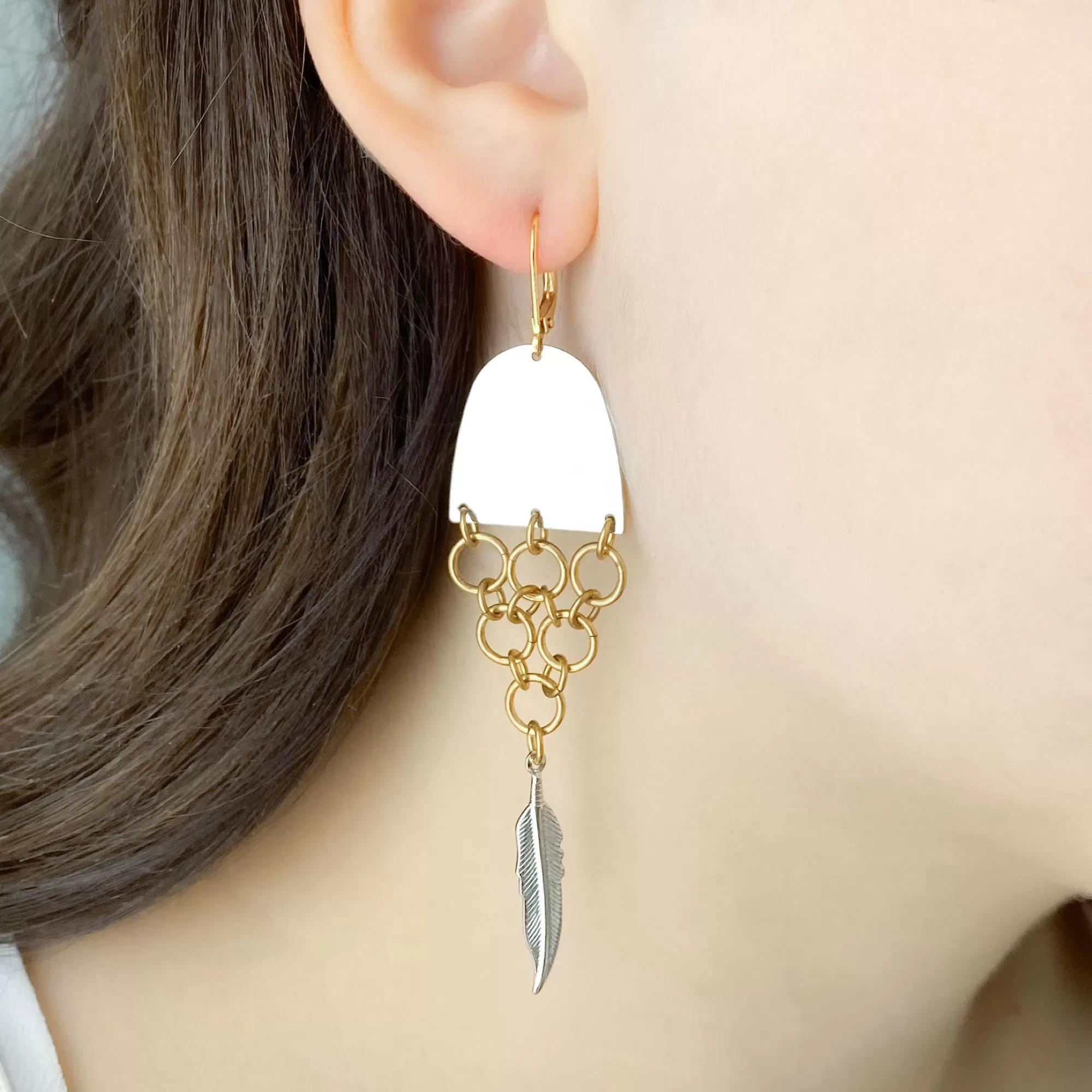 MONOHAN silver and brass fishtail earrings