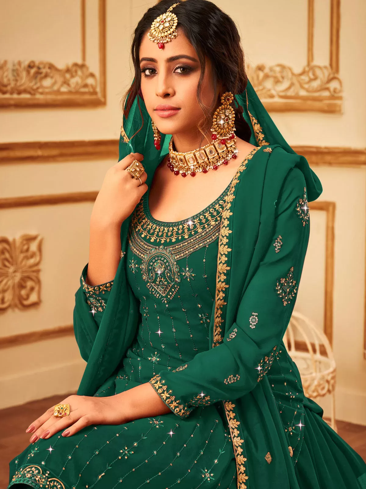 Odette Women Dark Green Colored Embroidered With Embellished Georgette Semi Stitched Sharara Suit